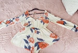 Floral patterned longsleeved romper
